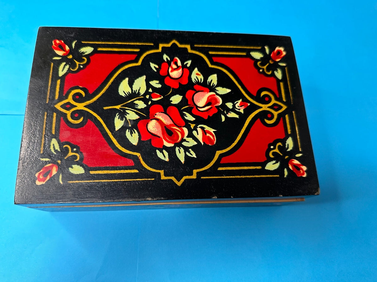 Soviet jewelry box open with bright red velvet lining