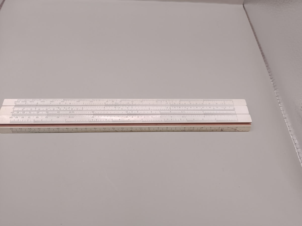 Wooden USSR slide rule with calculation scales, front view