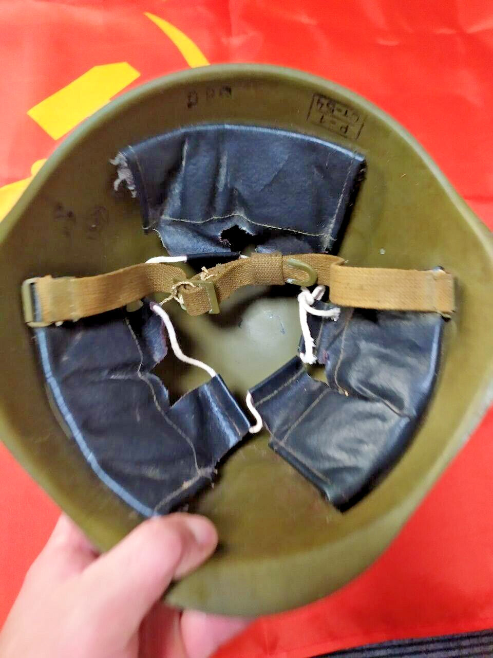 WWII Soviet helmet showing marks and scratches on the shell – detail 7