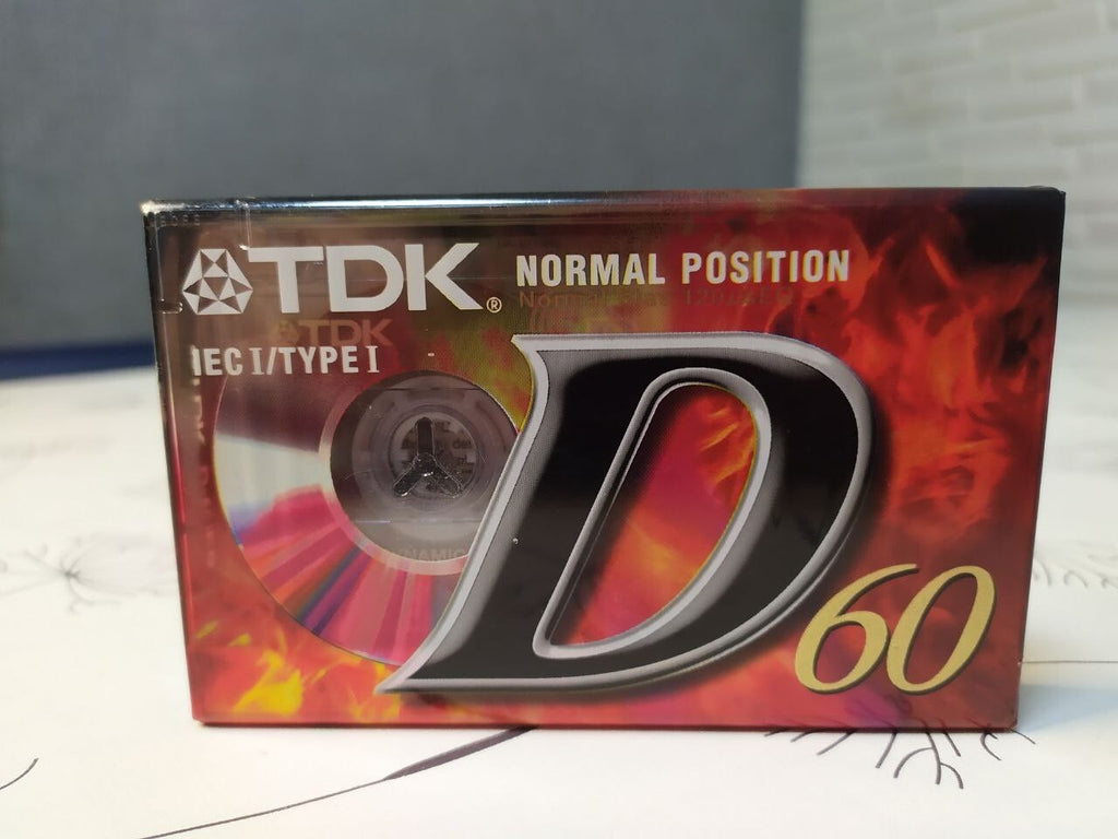 Blank cassette tape TDK Dynamic D60 with Fire / Lava wrap design