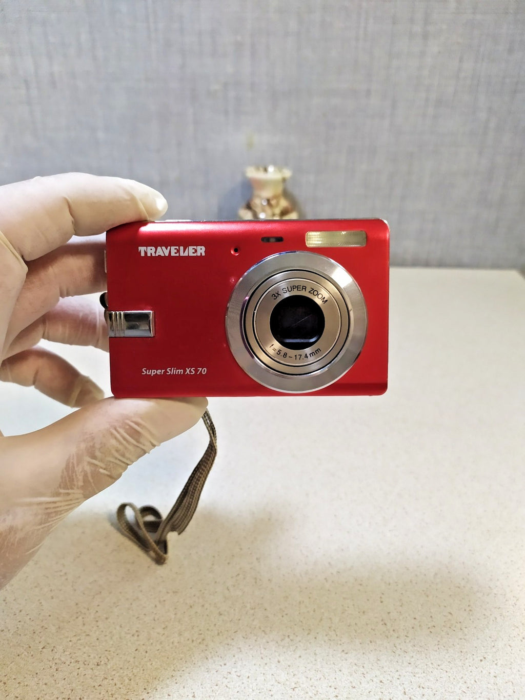 Traveler Super Slim XS 70 Y2K digital camera in metallic red