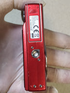 LCD screen with black dots on the red compact digital camera – detail 12