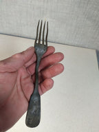 Imperial Russian copper fork with four tines, close-up of the tine root