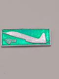 Tu-144 Soviet supersonic airliner pin badge in green enamel, vintage USSR