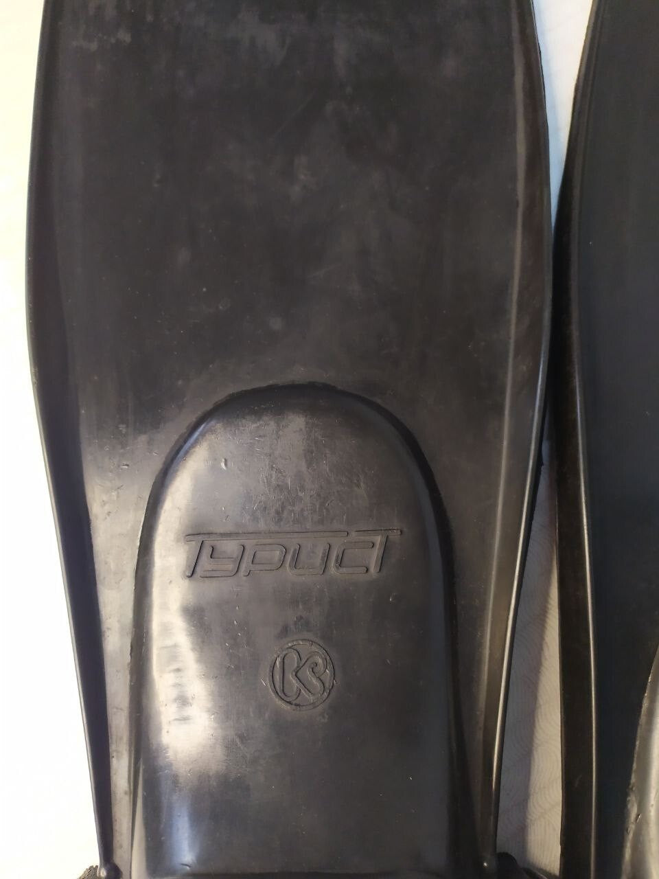 Turist brand name and KR factory logo embossed on the fin