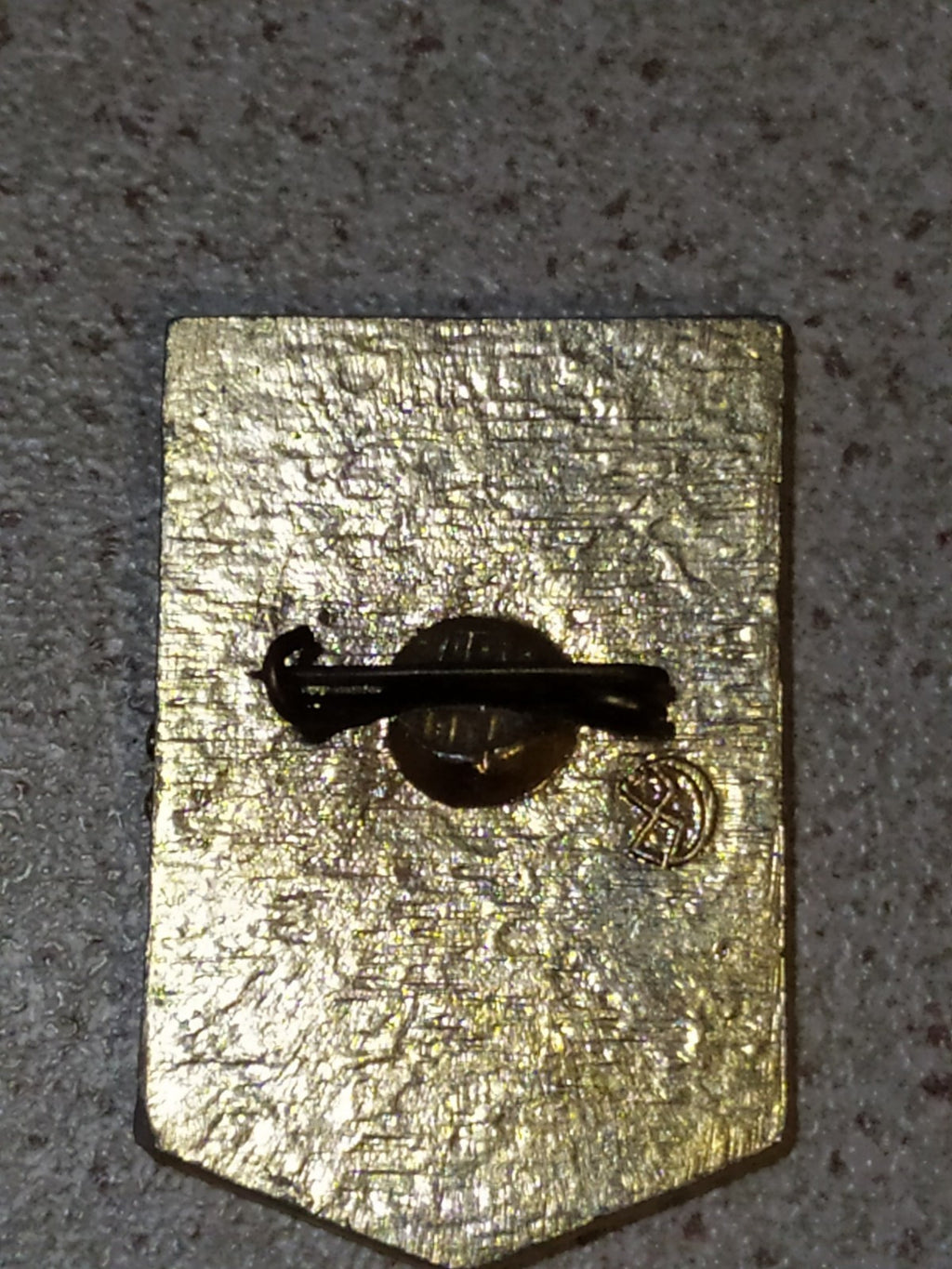 Old Soviet pins: Udarnik of Communist Labor badge close-up