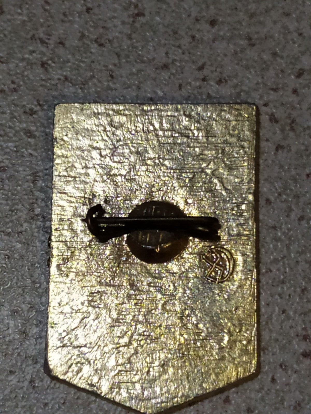 Old Soviet pins: Udarnik of Communist Labor badge close-up