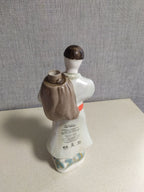 Korosten porcelain Kozak figurine bottle with sack on his back