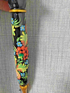 Petrykivka floral painting on a Ukrainian wooden bulawa mace – detail 14