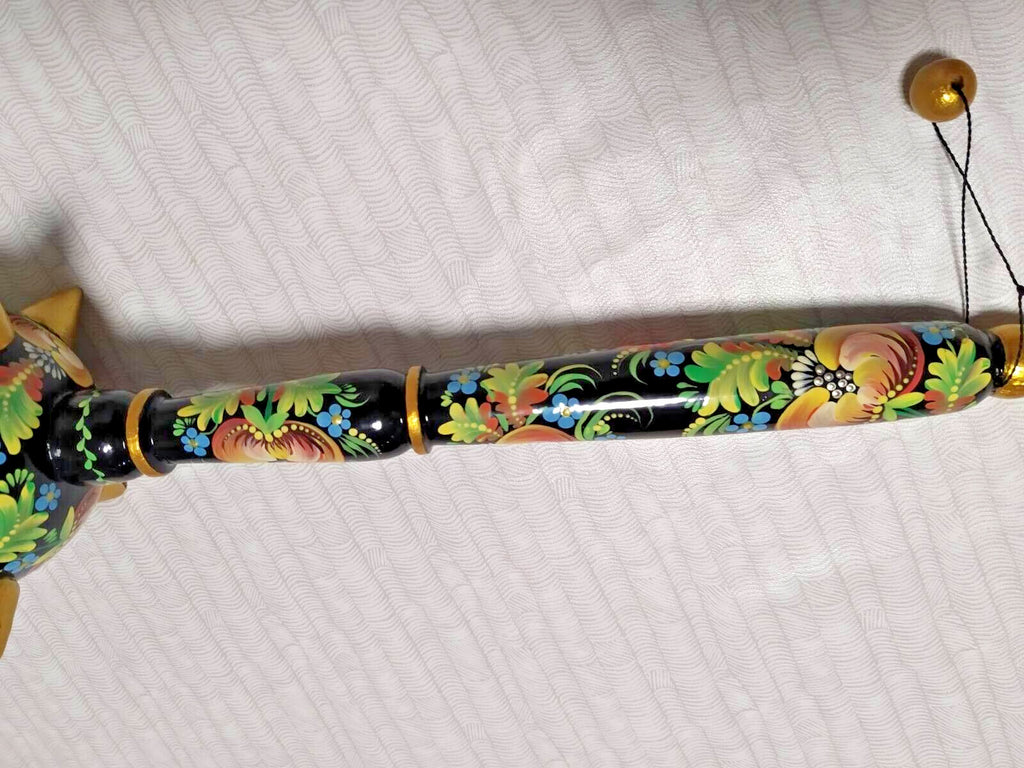 Hand-painted Ukrainian mace with wooden bead pendant at the base