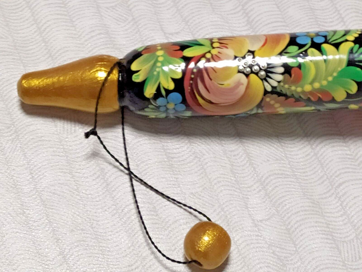 Petrykivka floral painting on a Ukrainian wooden bulawa mace – detail 8