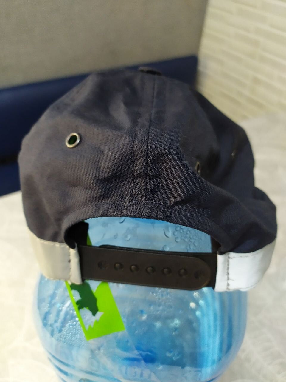Plastic snapback strap and size 54 tag of the patrol police cap