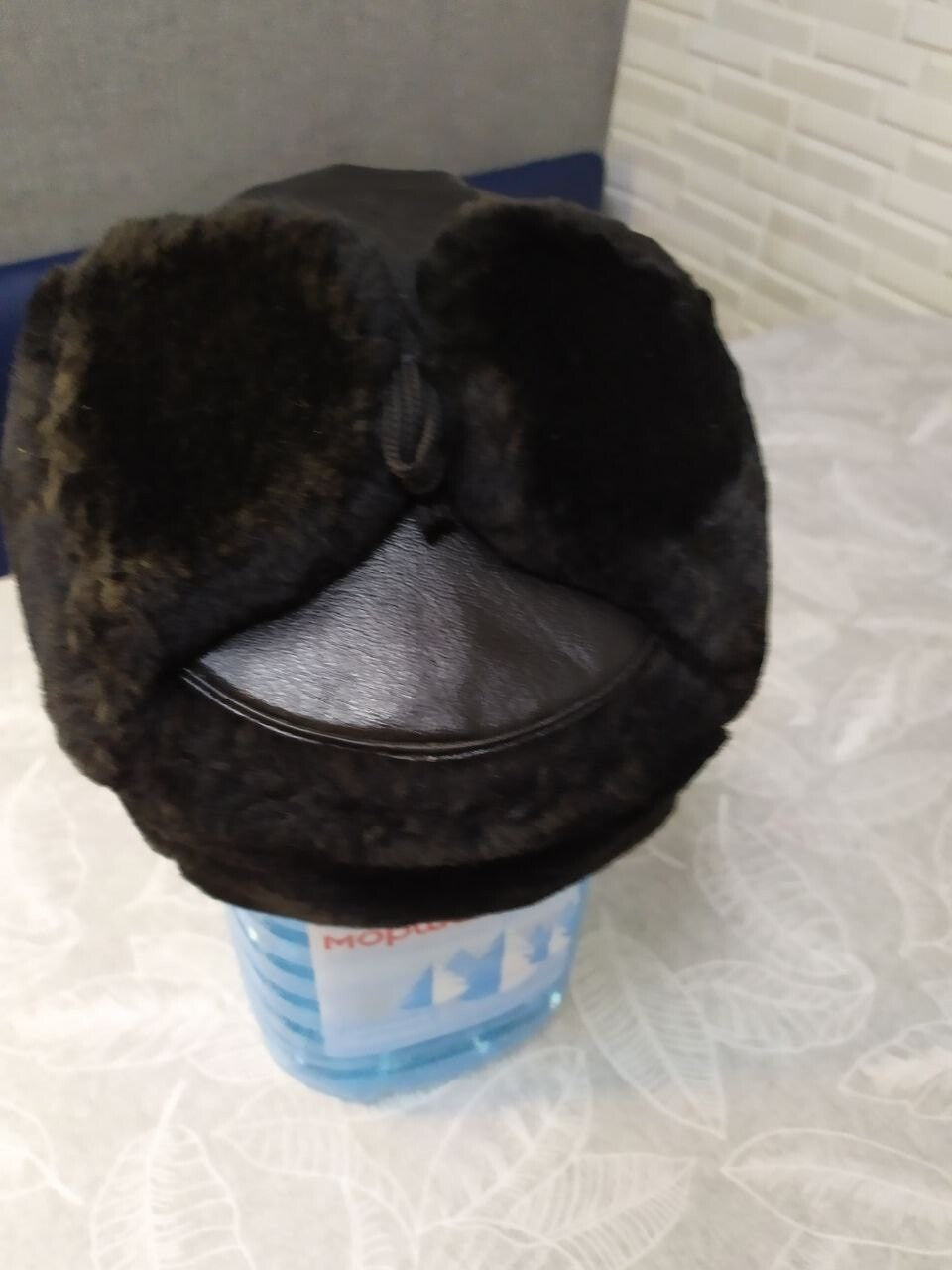 Faux fur earflaps with ties on the Ukrainian police hat