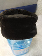Inner size 54 tag of the black ushanka style cap