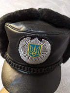 Inner size 54 tag of the black ushanka style cap – detail 7