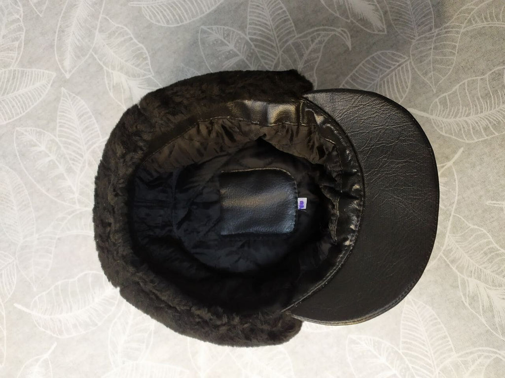 Embroidered Tryzub patch with silver-tone wreath on the winter uniform hat – detail 8