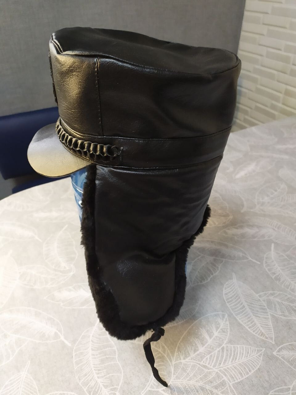 Faux fur earflaps with ties on the Ukrainian police hat – detail 9