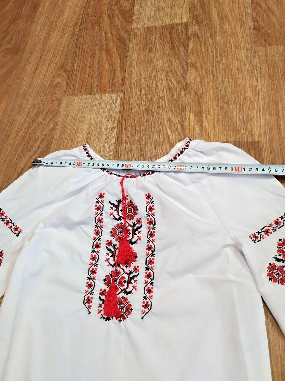 Girls peasant blouse laid flat with measuring tape – detail 7