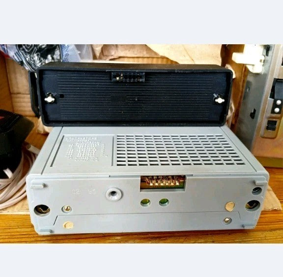 Soviet transistor radio Ural-Avto-2 with car mounting frame and speaker