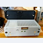 Soviet transistor radio Ural-Avto-2 with car mounting frame and speaker
