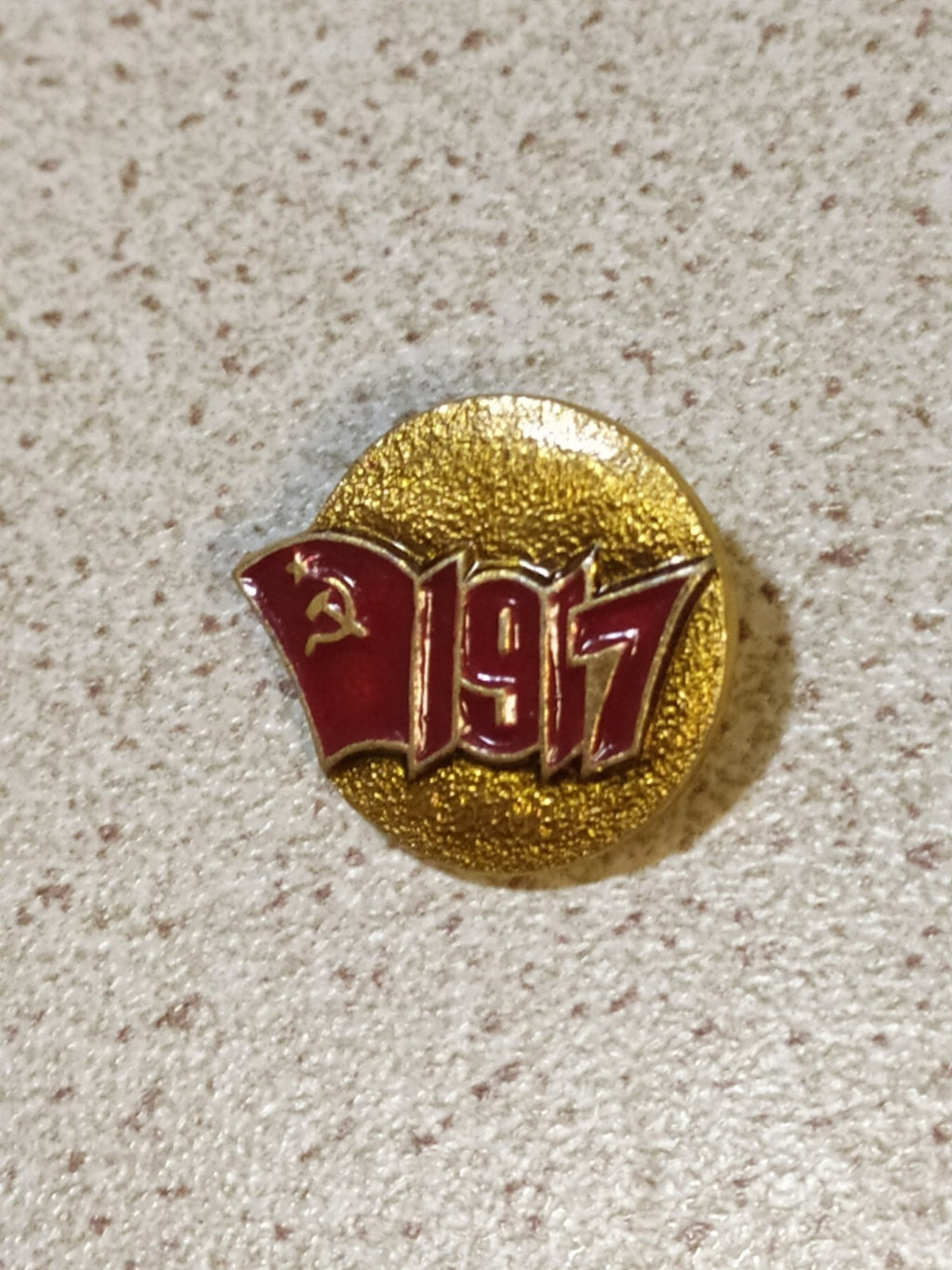 Vintage Soviet 1917 pin with hammer and sickle on the front