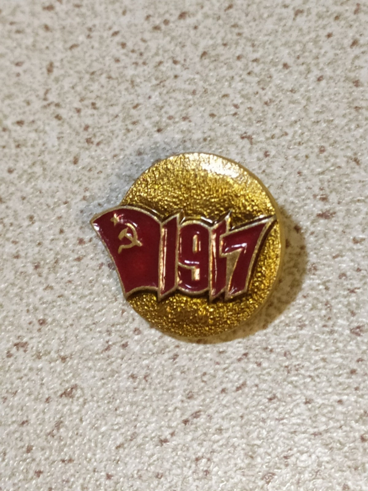 Vintage Soviet 1917 pin with hammer and sickle on the front