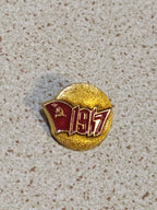 Old USSR commemorative badge showing LMD mark on the reverse