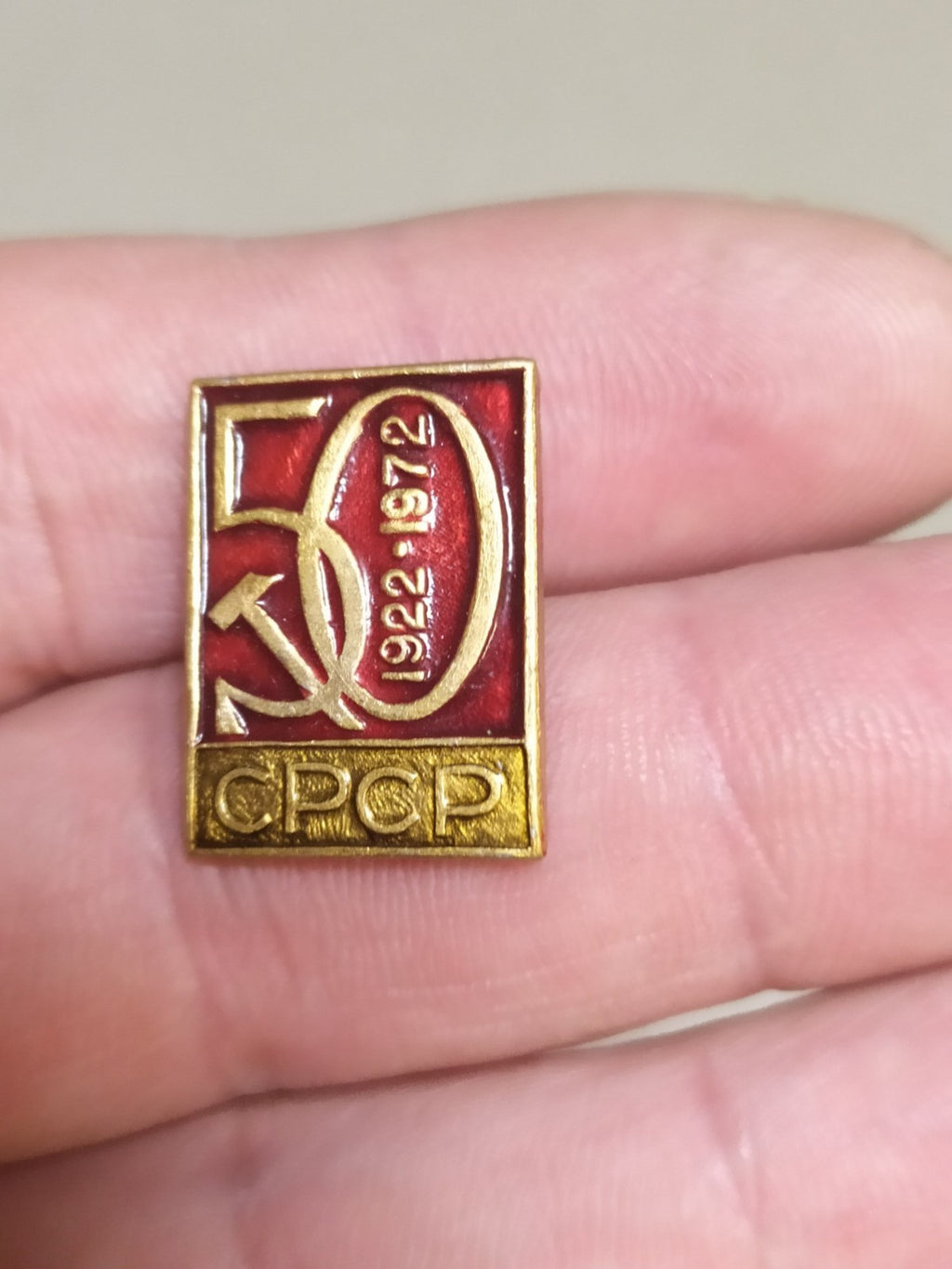 Soviet 1922-1972 jubilee badge with enamel sickle and hammer