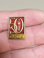 Soviet 1922-1972 jubilee badge with enamel sickle and hammer
