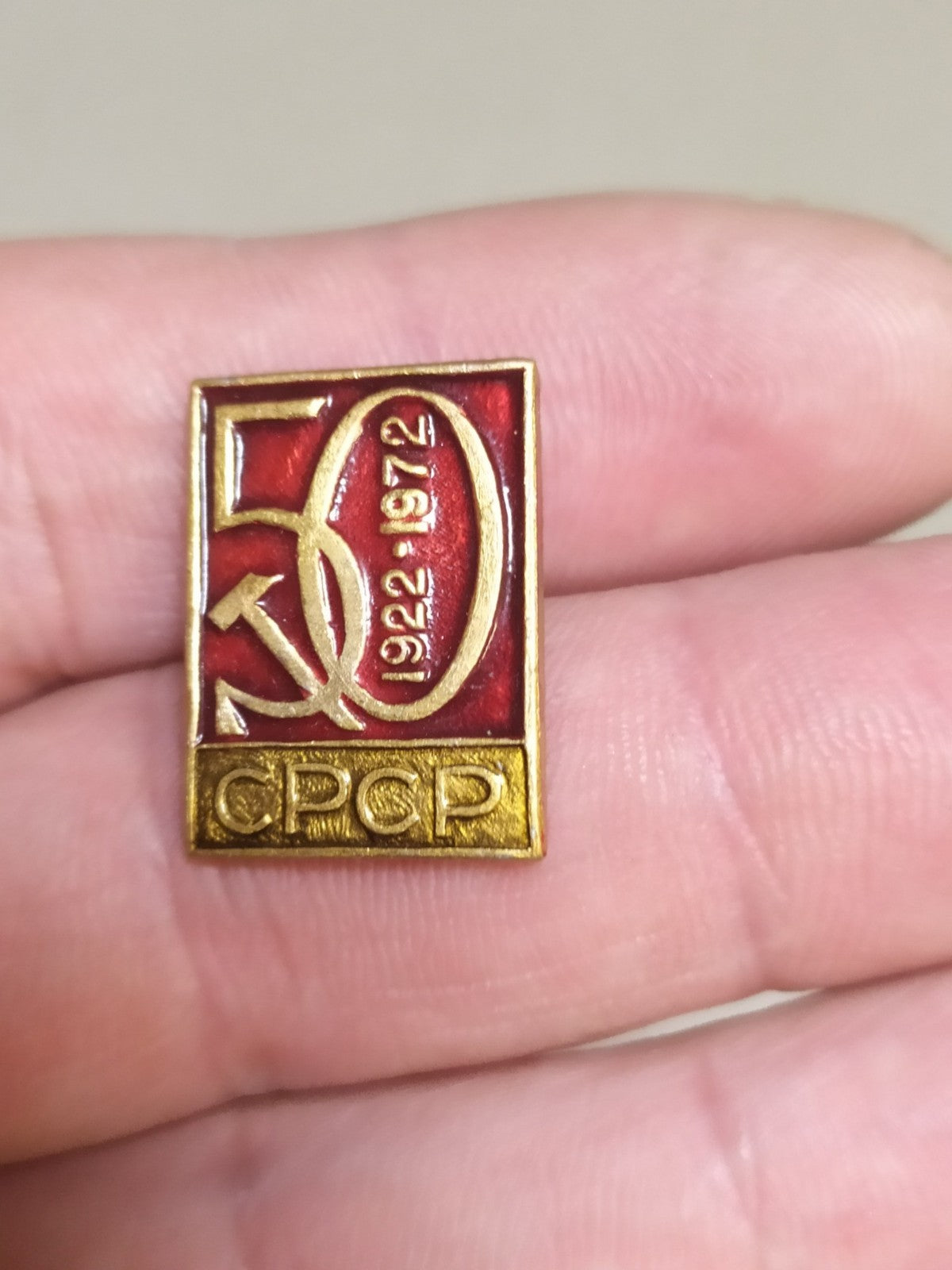 Soviet 1922-1972 jubilee badge with enamel sickle and hammer