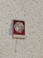 Soviet state emblem pin marking 1922-1972 on a plain background