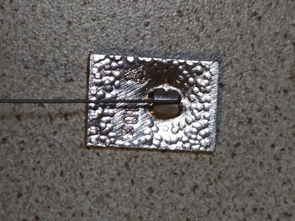 Soviet state emblem pin marking 1922-1972 on a plain background – detail 5
