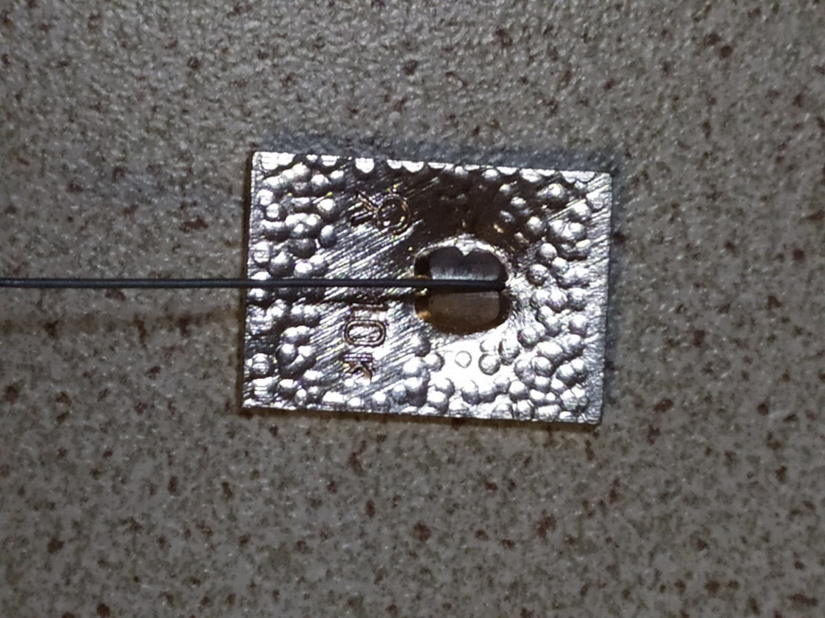 Soviet state emblem pin marking 1922-1972 on a plain background – detail 5