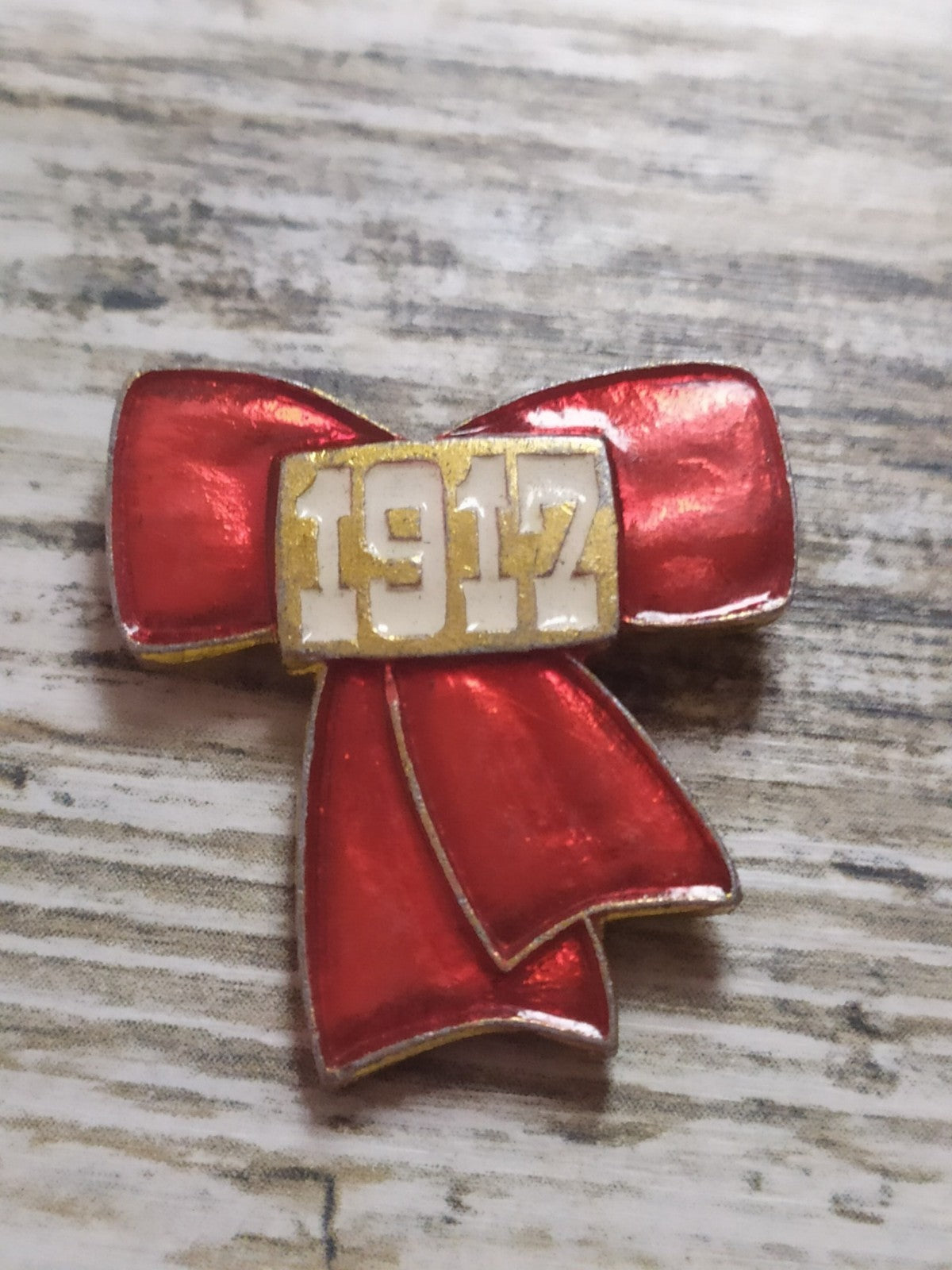 Soviet ribbon pin with red enamel finish, front view
