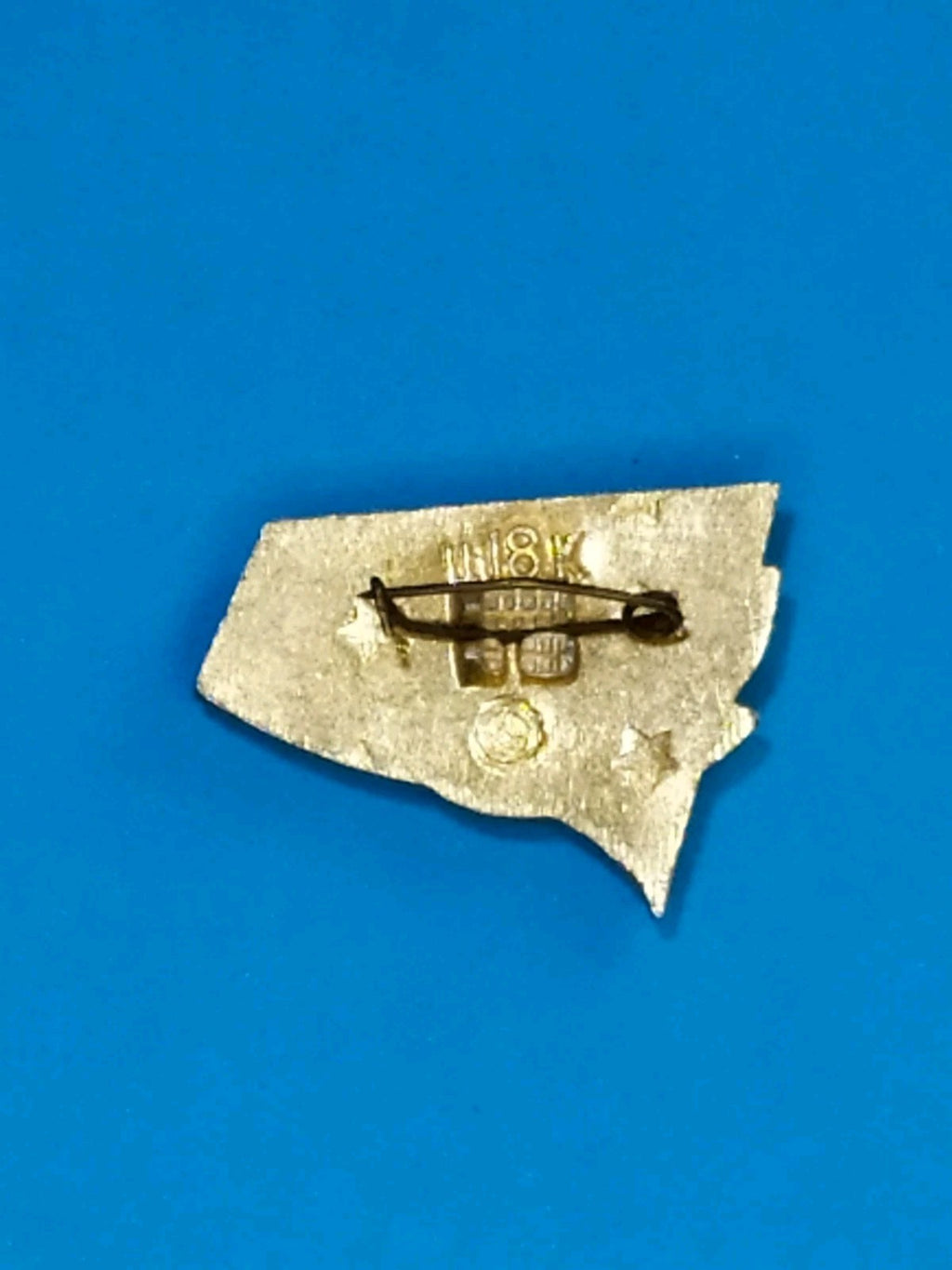 Reverse of the USSR badge with price mark and safety pin