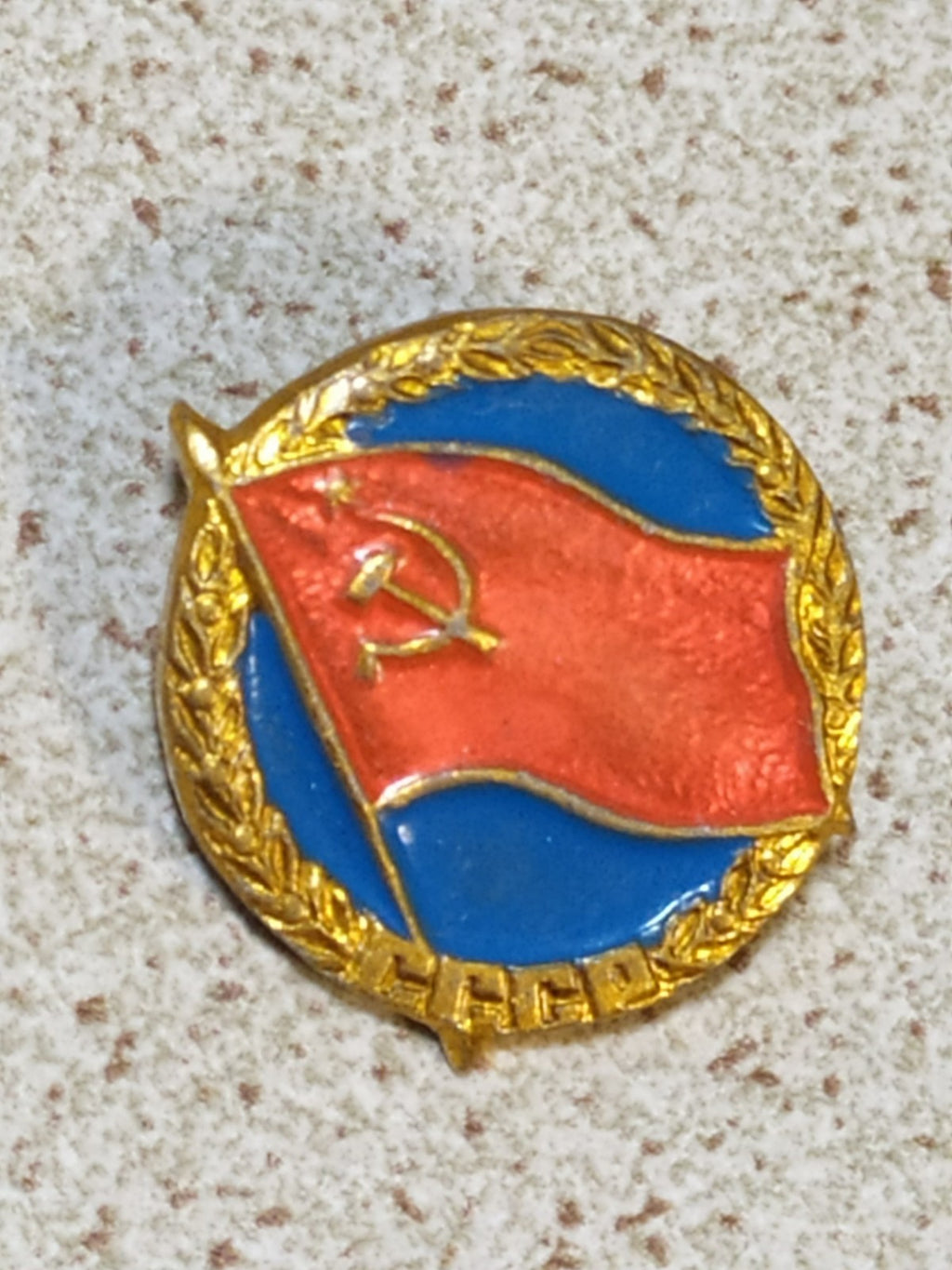 Soviet flag pin with blue background, front view