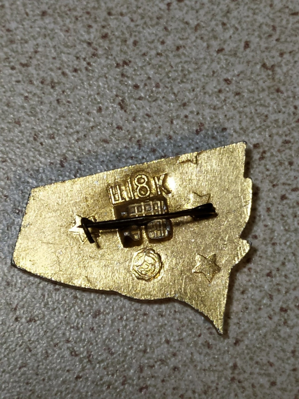 Reverse of old Soviet 1917 red star enamel pin