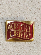 Vintage Soviet pin marked 1917-1977 with a flag