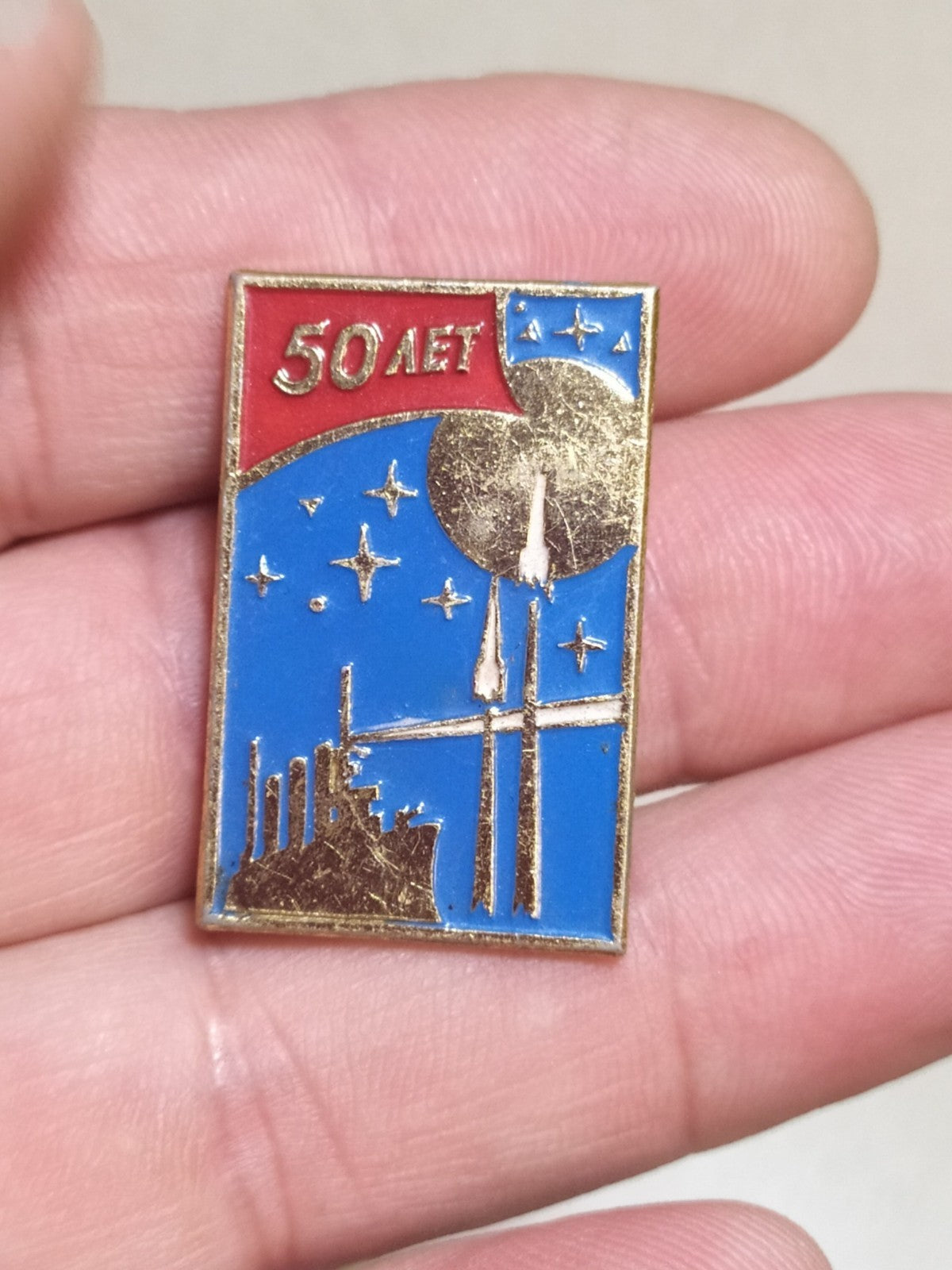 Soviet space rocket and Aurora cruiser badge front view