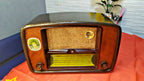 VEF Baltika RZ-1 vintage tube radio with rounded Art Deco case and yellow dial