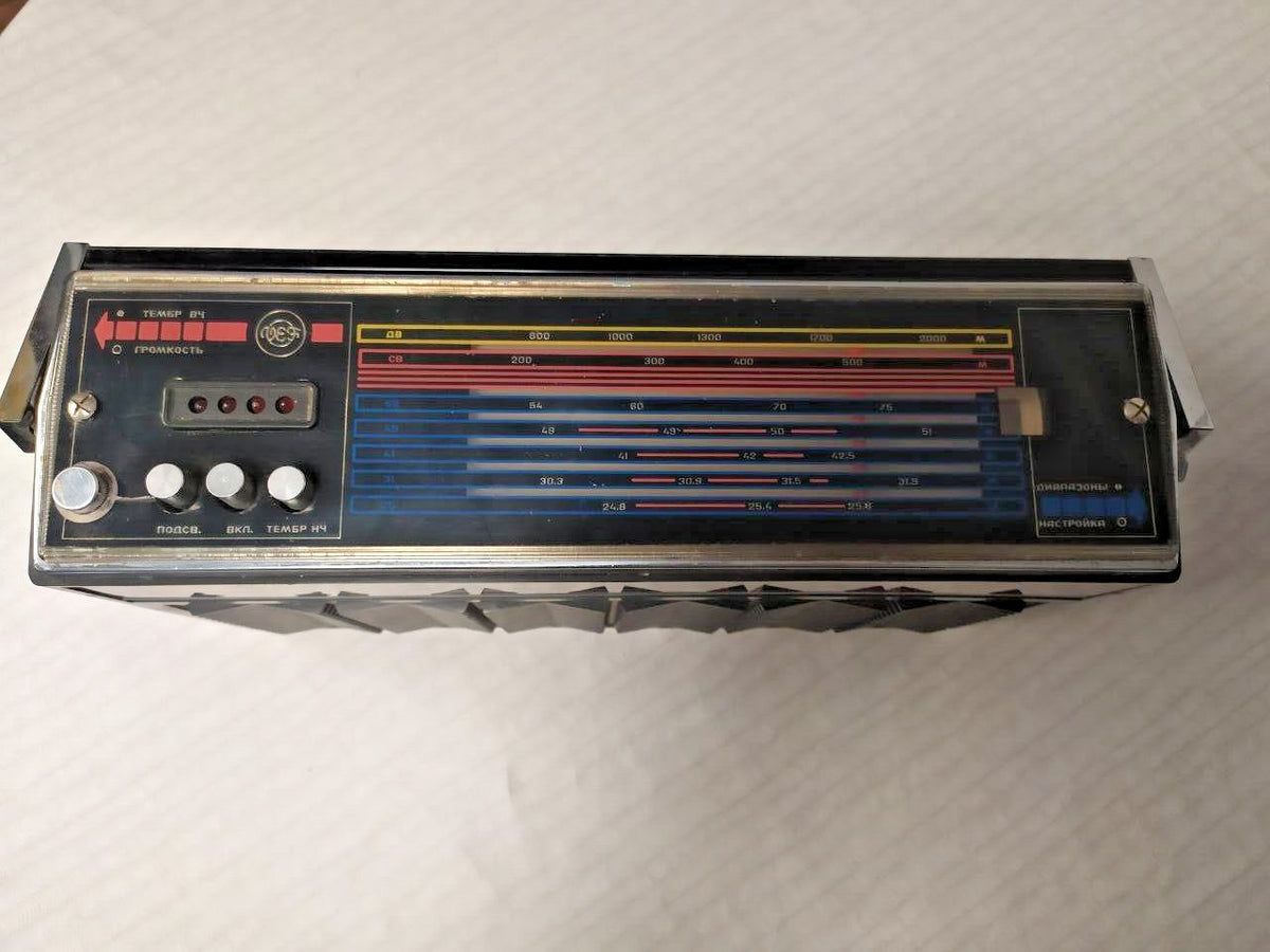 Spidola portable radio top panel with frequency map and telescopic antenna