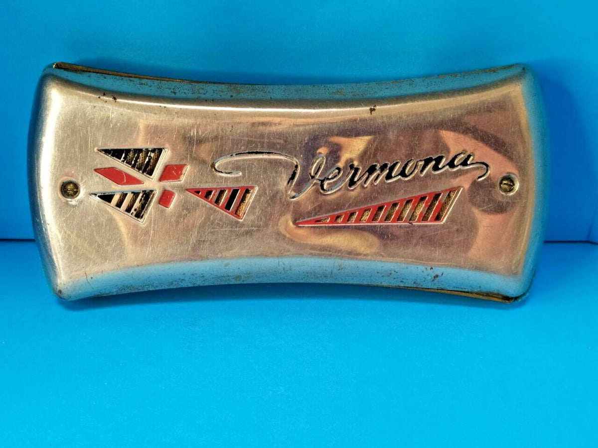 GDR Vermona harmonica with red and black logo and geometric cutouts on chrome covers – detail 5