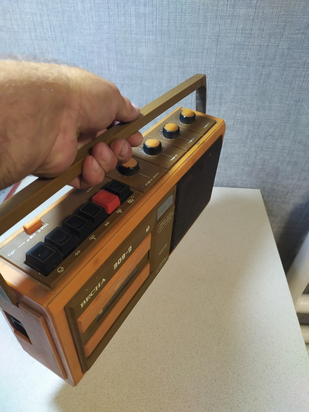 Orange and brown Soviet tape recorder with carrying handle and Cyrillic labels – detail 8