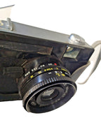 Vilia camera with black textured body and silver bottom plate