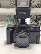 Vintage 35mm film camera Nippon AR-4392F with detachable flash and original box