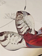 Murano style glass fish close-up of red, blue, yellow and green swirls – detail 13