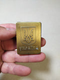 Vintage brass gas lighter with the Ukraine trident coat of arms