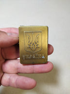 Vintage brass gas lighter with the Ukraine trident coat of arms