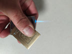 Back of the vintage gas lighter with smooth brass and vent holes – detail 9