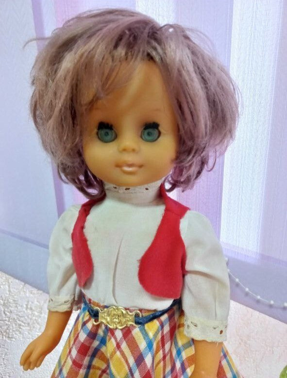 Vintage East German doll face with large turquoise eyes and eyelashes